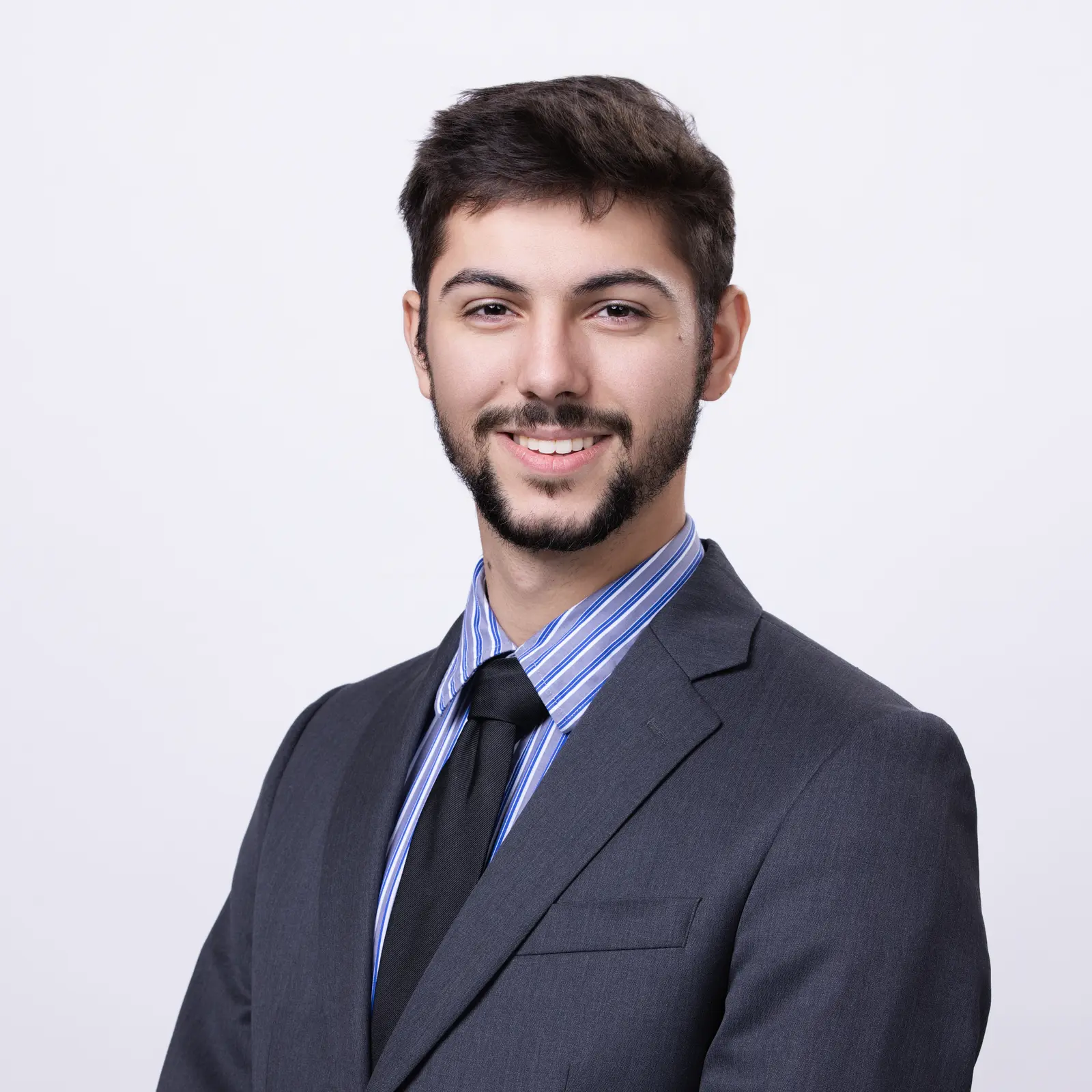 Professional headshot of Tyler Pereira